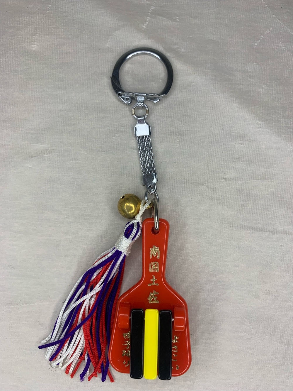 Japanese Red Paddle Tassel Keychain with Gold Bell and Multicolor Accent Bars